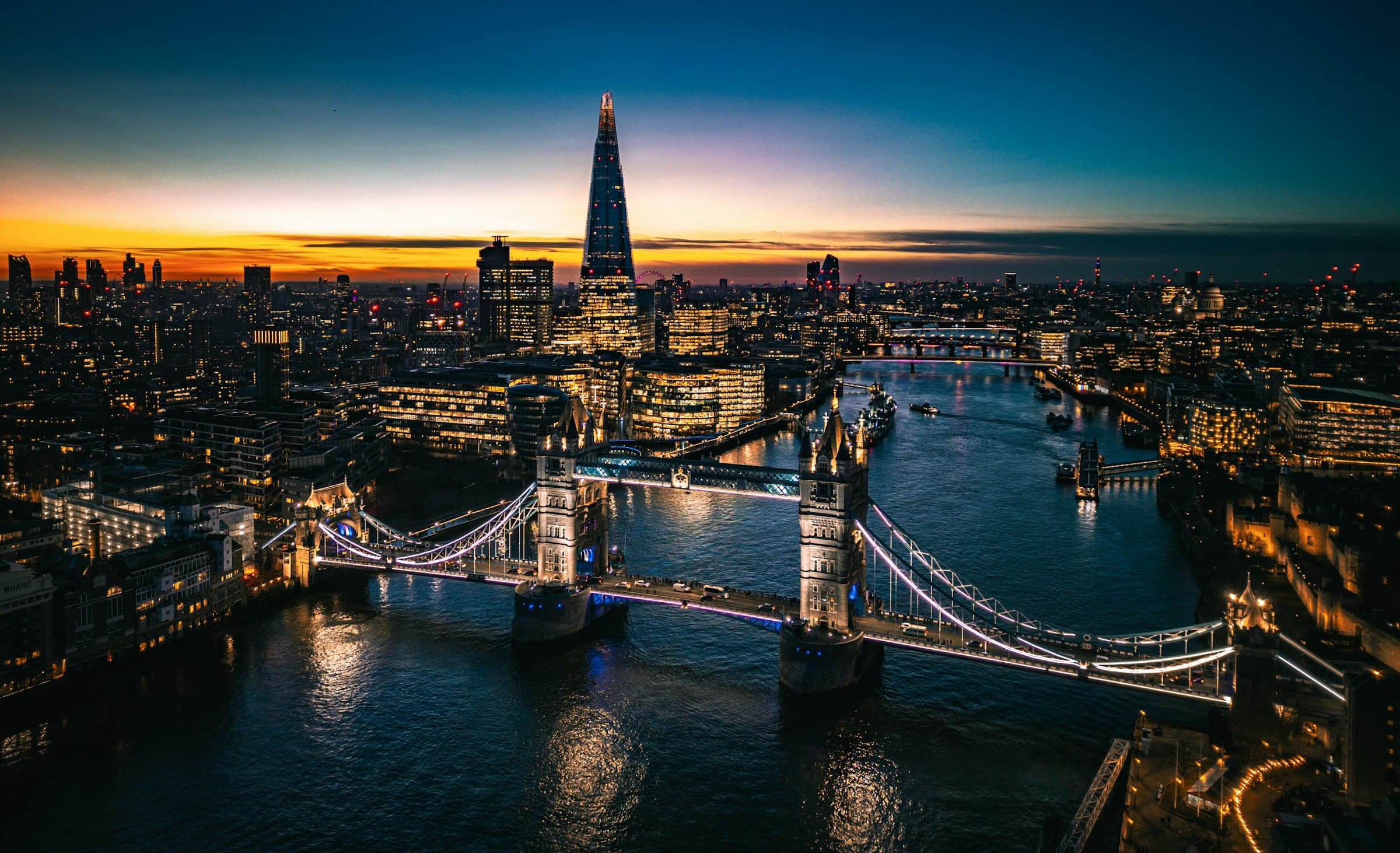 Tower Bridge and the Shard over the River Thames in London at dusk